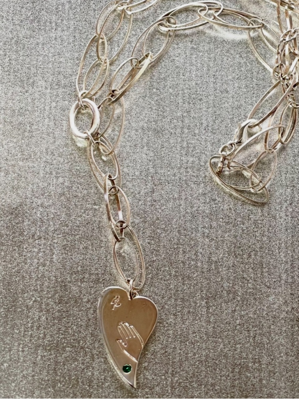 John Edwards “Hand on my heart” necklace